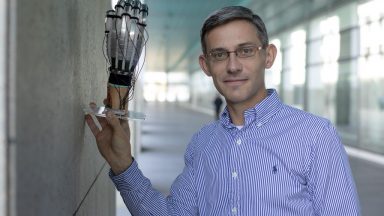 Scientists from EPFL and ETH Zurich have developed an ultra-light glove – weighing less than 8 grams per finger– that enables users to feel and manipulate virtual objects. Copyright: EPFL - Marc Delachaux access technology microtechnology licences patents services epfl
